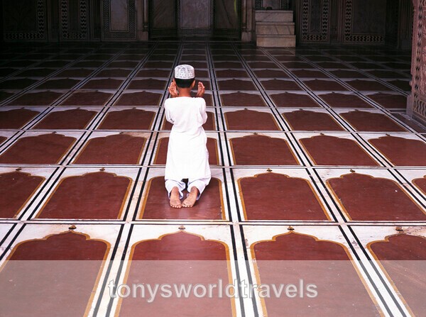 Young boy at prayer,Taj Mahal, India - Children
