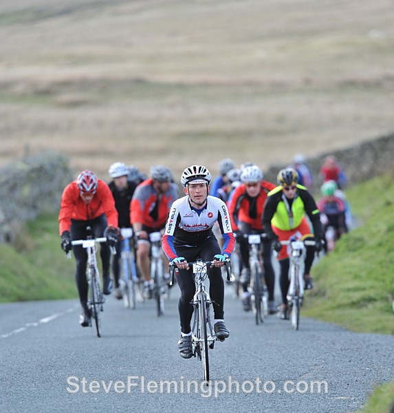 Group climbing Kirkstone Pass Fred Whitton - Fred Whitton Challenge over the years