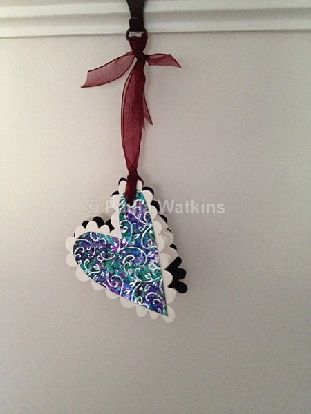 A tiny hanging book Love Token. - Altered Books and Handmade Books