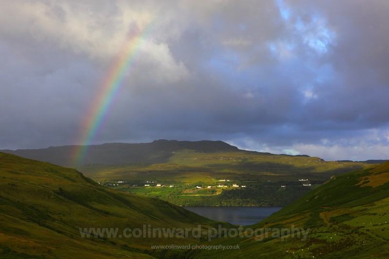 Rainbow over the hills of Loch Harport, Skye. - Scotland