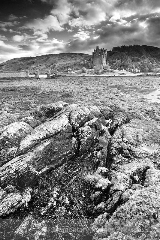 Eilean Donan rocks black and white - Black and White