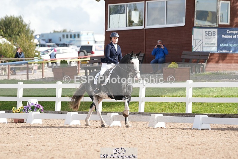 250906-105238-01567 - 061-christine.harrisonRed.Flair