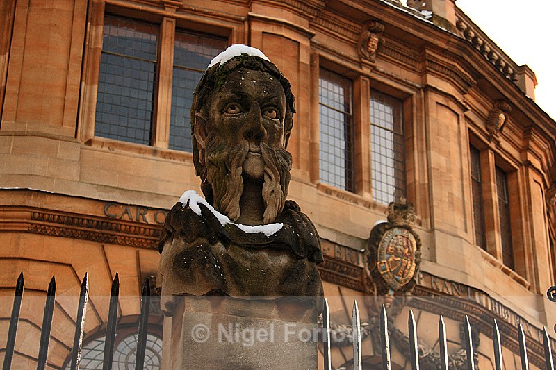 Snow-capped bust outside the Sheldonian Theatre - Oxfordshire, England