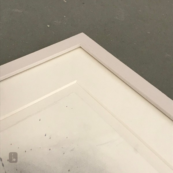 Mounted to show deckled edges - frames