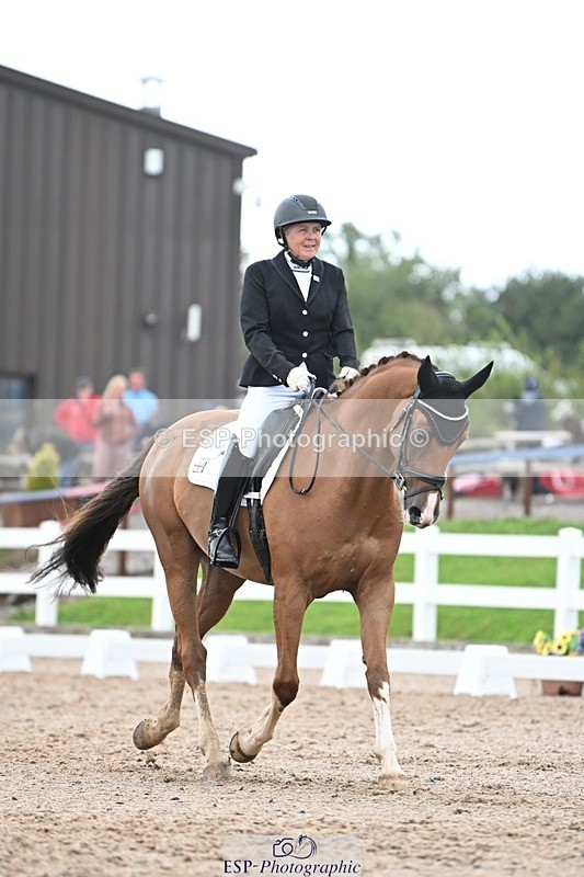 250907-141333-09203 - 007-Karen.DanceHevans.Sign.of.the.Times