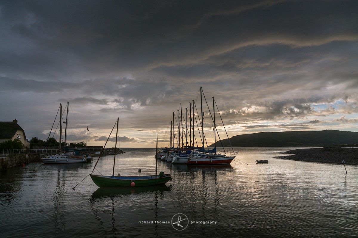 Porlock weir Somerset summer sunrise looking over the harbour