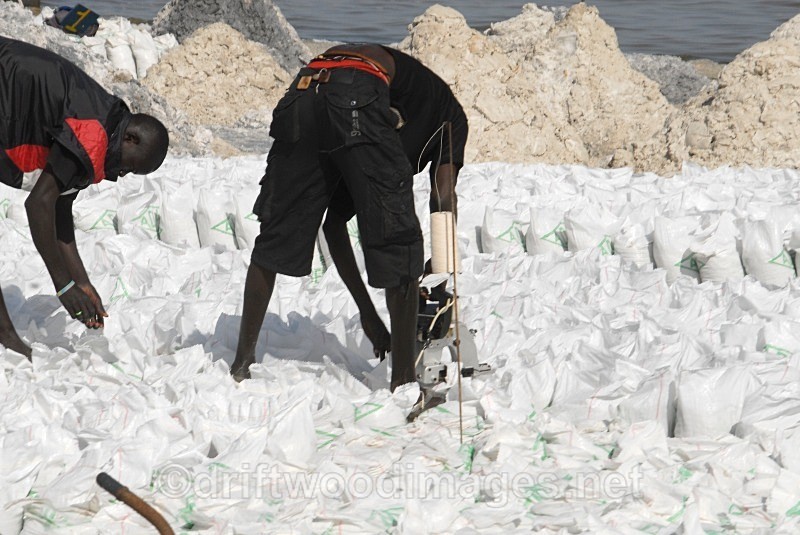 Senegal Lac Rose salt production 12 sewing bags detail - Senegal Salt Production at Lac Rose