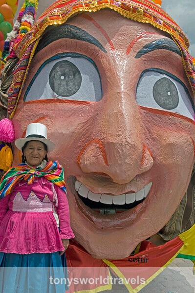 Smiling lady and mask, Cusco, Peru - Smiling faces of the World