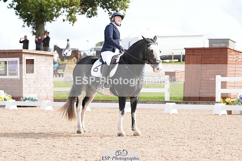 250906-105439-01573 - 061-christine.harrisonRed.Flair