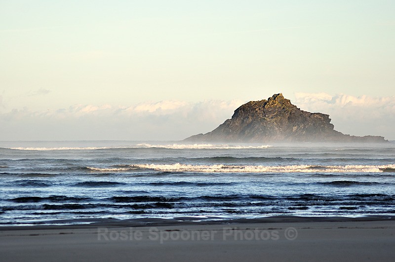 Waves roll in past Goose island on Crantock Beach in Cornwall - Cornwall Misc