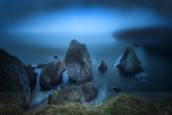Sea Fog At Dusk, Nohoval Cove, Co. Cork, Ireland.