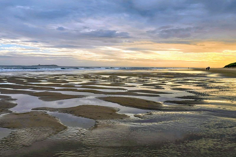 Receding tide at Bamburgh, Northumberland - Northumberland