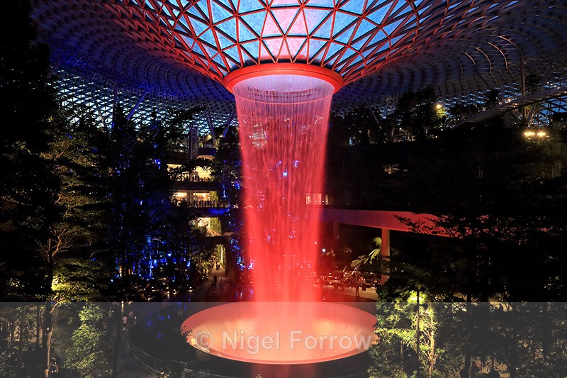 Rain Vortex illuminated red, Jewel Changi Airport, Singapore - Singapore