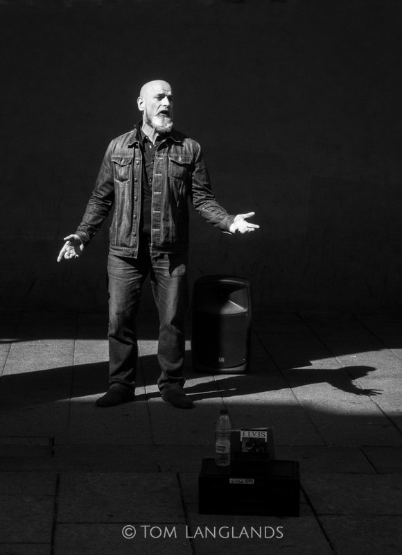 Singing in the Shadows - Street Photography