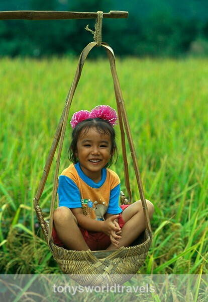 Child in basket, Guilin,  China - Children