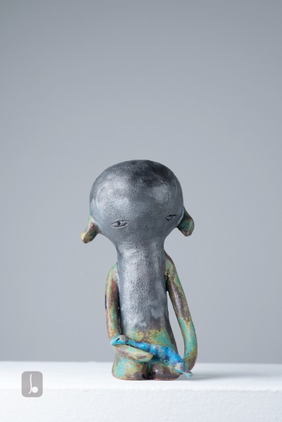 Boy with snake - departures and returns