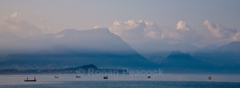 Evening Fishing on Lake Garda - European Landscapes