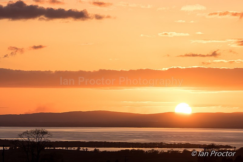 Sun Dips Below Horizon Beyond Lough Neagh - County Antrim