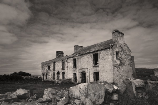 Fine Art Monochrome Of Ruined Houses On Brow Head, West Cork, Ireland.