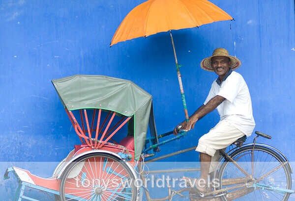 Smiling man on rickshaw Panang Malaysia - Smiling faces of the World