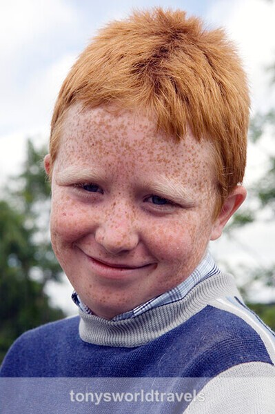 35, Young boy smiling,  Spancil Hill Horse fair, Co.Clare - Horse Fairs, Ireland