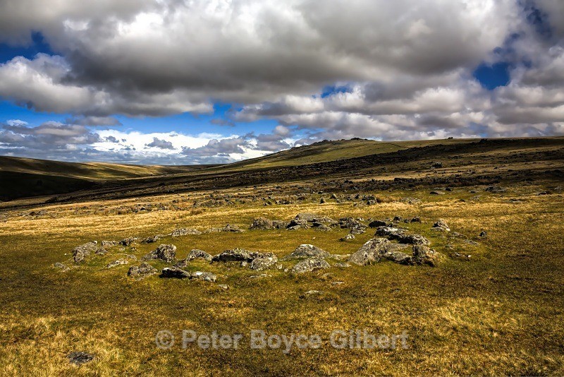 Stone circle, with Cox Tor in the distance - The Moors