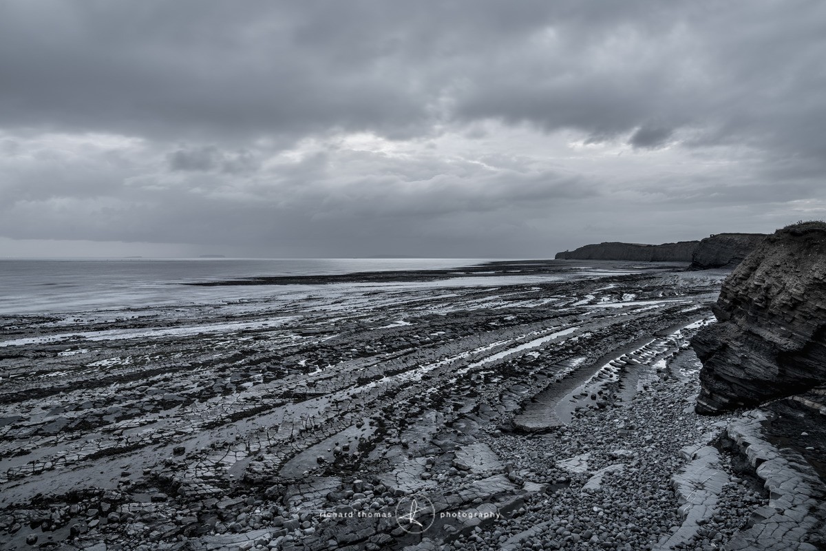 Kilve Pill beach in Somerset looking across the rock ledges at dawn