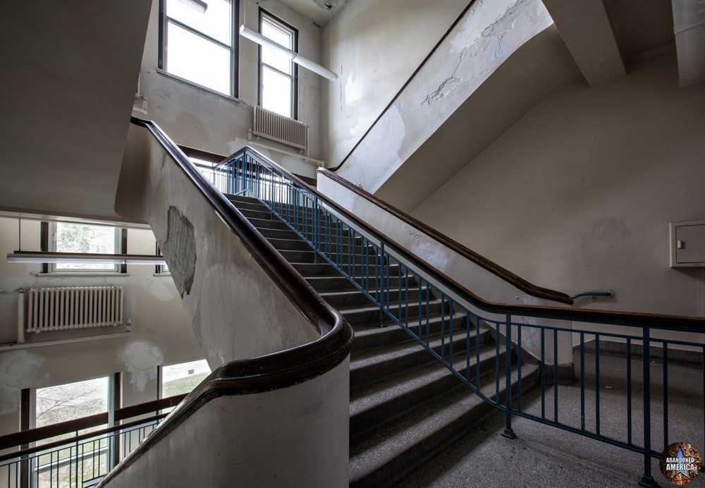 A stairway in Schenley High School shows evidence of the issues with plaster caused by humidity in the building